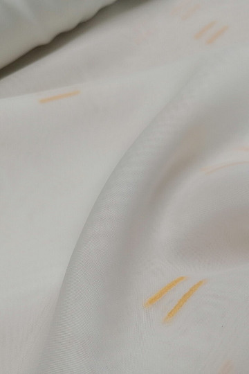 Rideau en voile crème clair avec lignes cousues orange clair