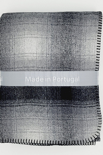 Couverture à carreaux gris