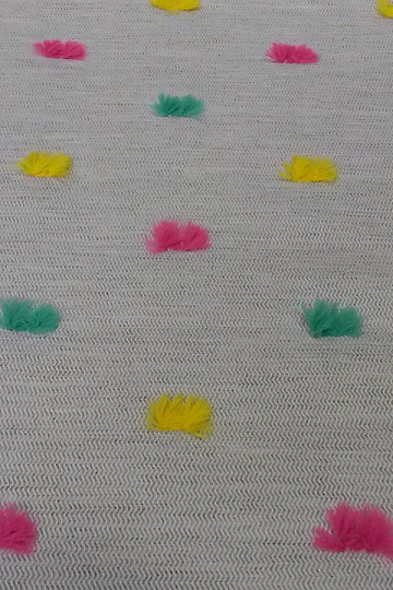 Tissu décoratif POMPONS