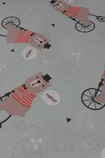 Tissu en coton OURS EN PELUCHE SUR UNE ROUE