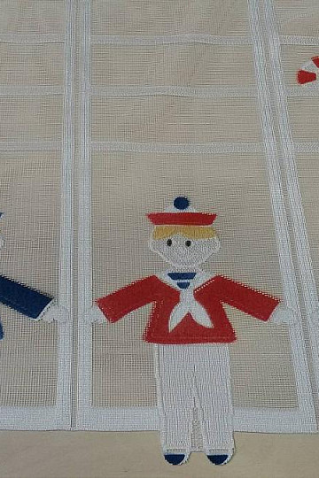 Rideau pour enfants sur le vitrail Marins