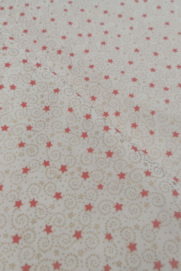Tissu de Noël en coton crème avec des mini étoiles