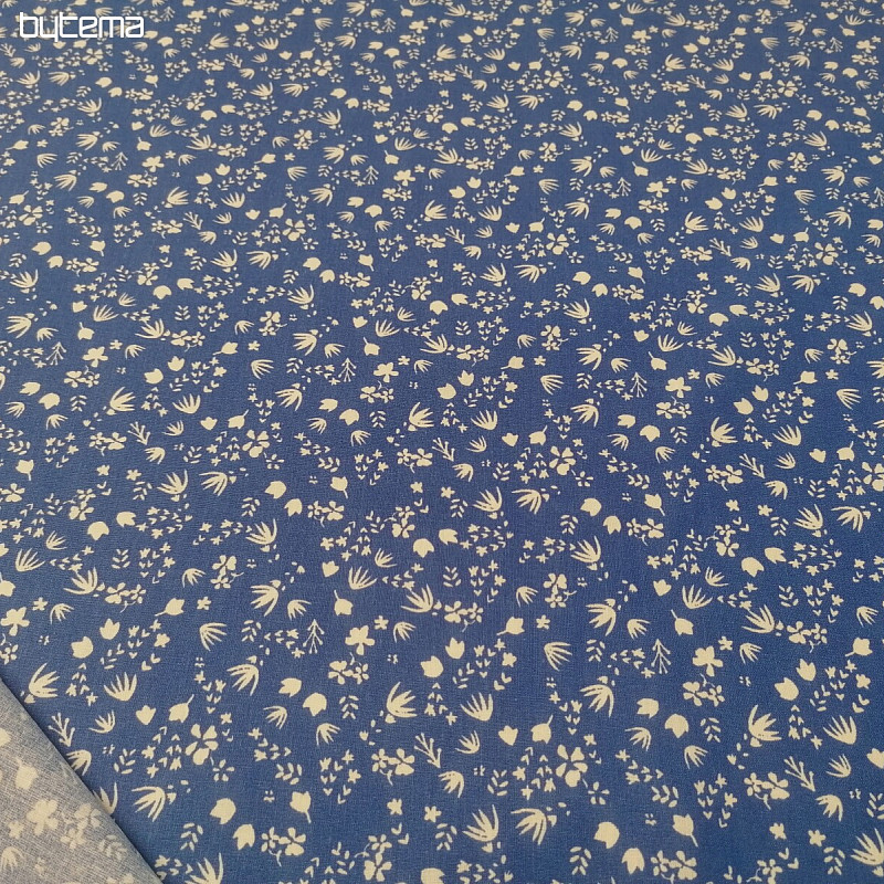 Tissu en coton bleu avec des fleurs de Gramina