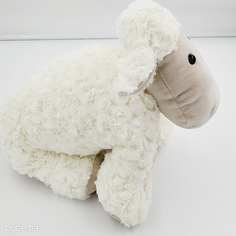 JOUET MOUTON À BOUTON