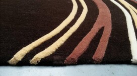 Comment bien poser un tapis ?