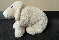 JOUET MOUTON sur un bouton