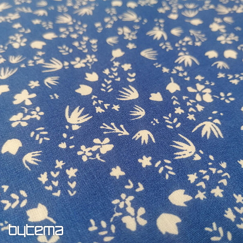 Tissu en coton bleu avec des fleurs de Gramina