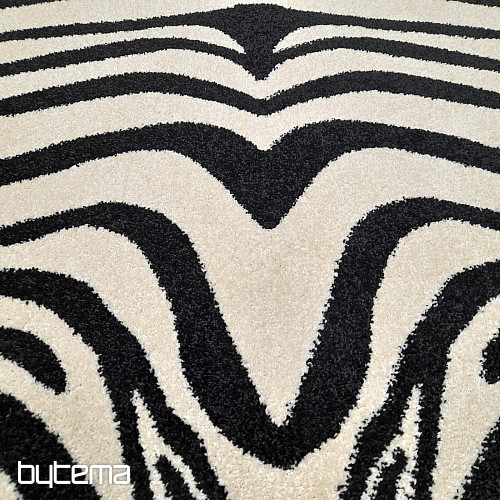 Tapis à pièces noir et blanc