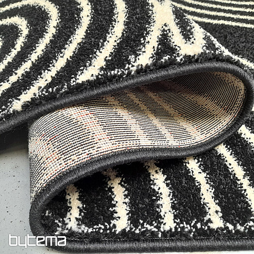 Tapis à cercles noirs et blancs