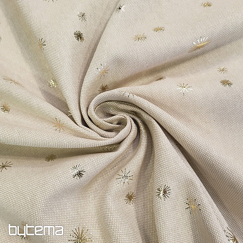 Tissu en toile de coton à motifs détoiles dorées sur la planche à découper