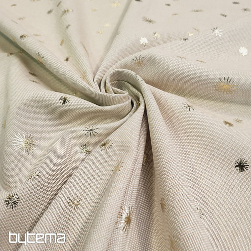 Tissu en toile de coton à motifs détoiles dorées sur la planche à découper