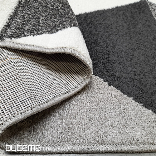Pièce tapis LOTTO triangles noir/blanc